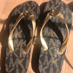 Gold Michael Kors flip flops, never worn, 8M